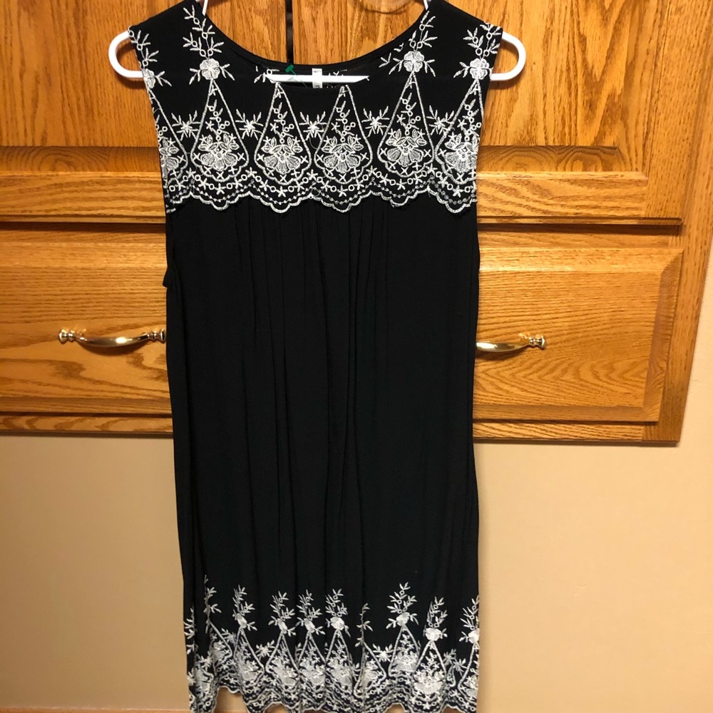 Black with white embroidered flowers